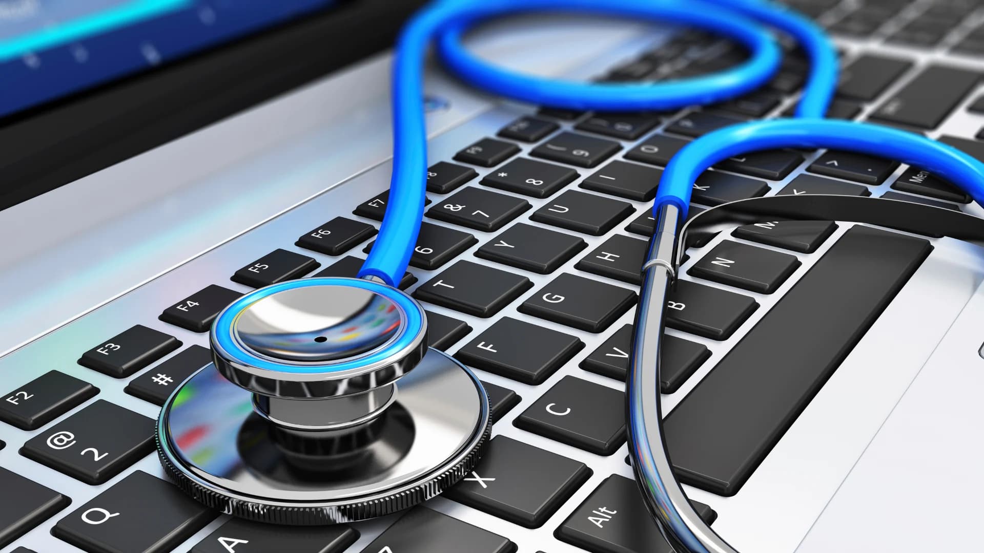 Stethoscoop op laptop toetsenbord — laptop diagnose